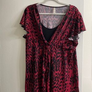 Dressy, black and red noise. Worn twice. Looks great with black dress pants